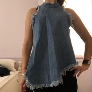 Blue denim asymmetrical top.